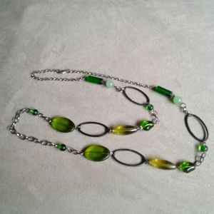 Glass bead necklace in varied shades of green.